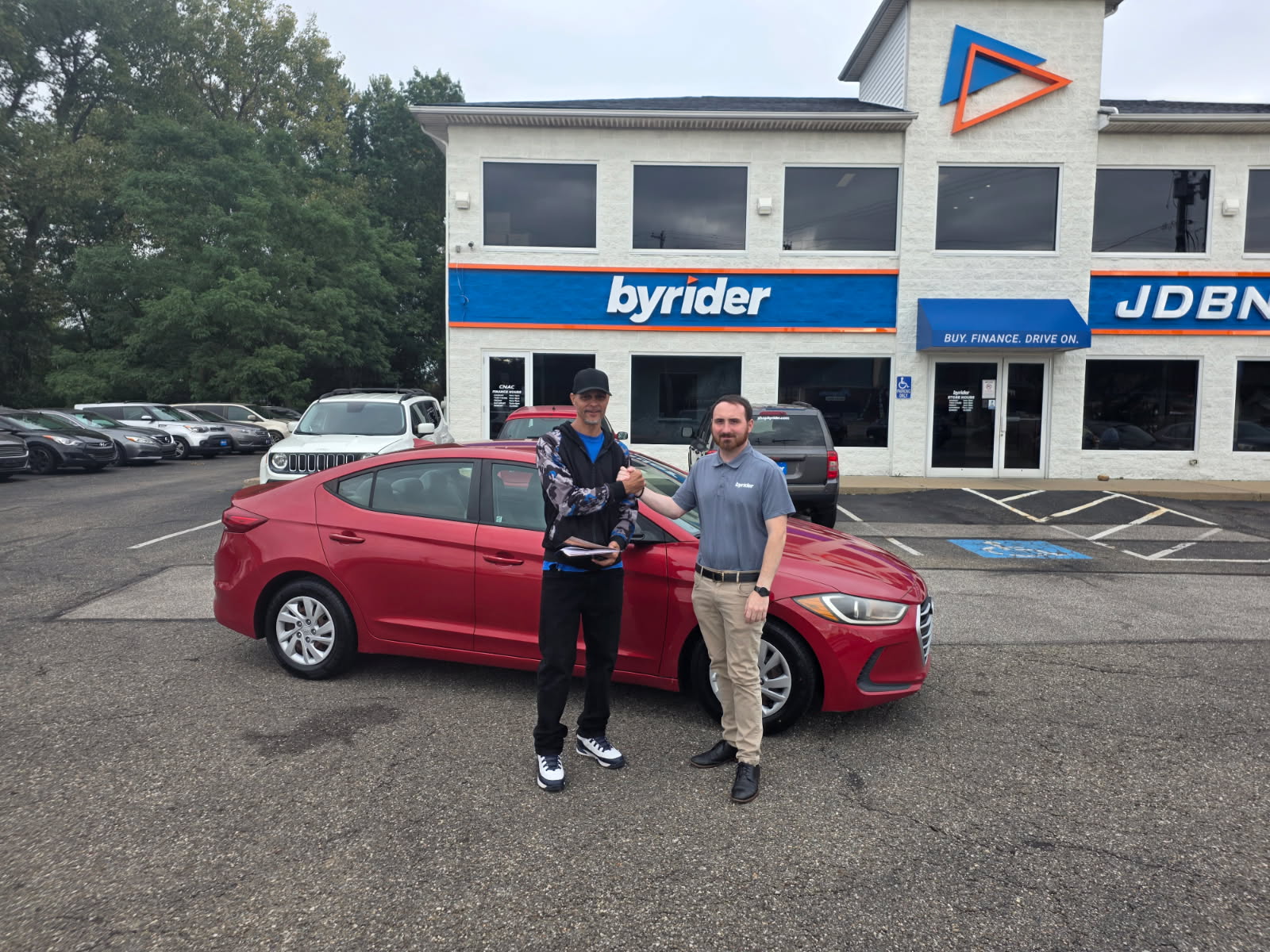 Byrider Akron customer with a used Hyundai Elantra at the Akron, Ohio lot