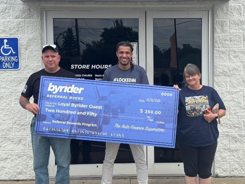 Three Byrider Ohio customers holding their $250 Referral Rewards check